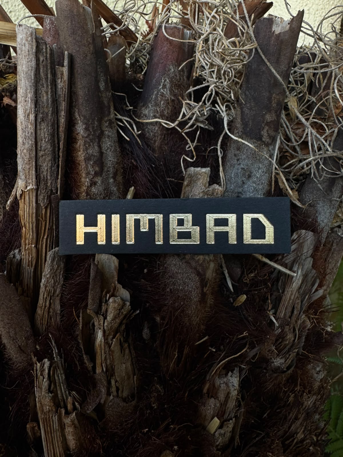 HIMBAD name card in gold foil